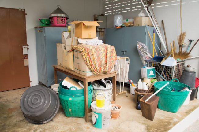 Cluttered garage - It's time to rent a self-storage unit