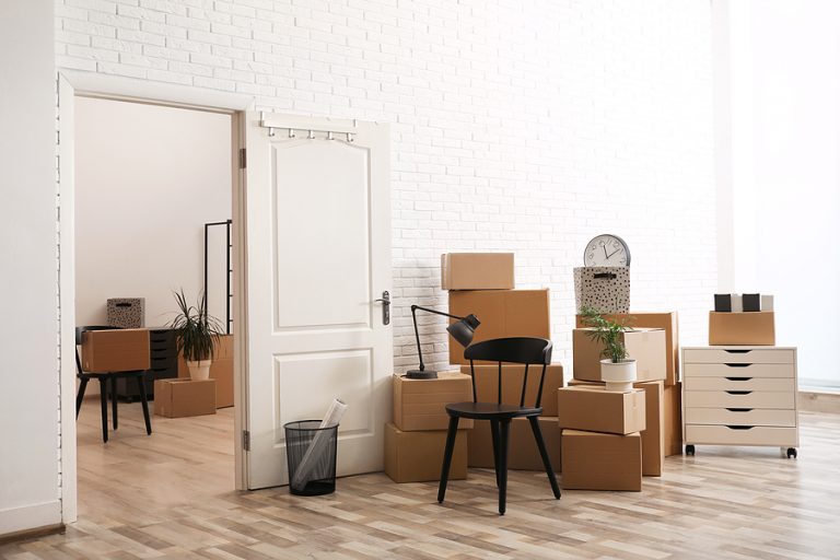 bigstock Cardboard Boxes And Furniture 427145210